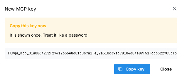 Copy this key now dialog with the flyga_mcp secret